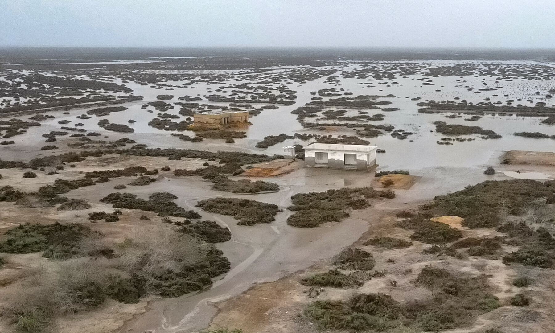 In this aerial photograph taken on June 25, 2025, abandoned houses are pictured in one of the villages of Kharo Chan town, in the Indus delta. &mdash; AFP
