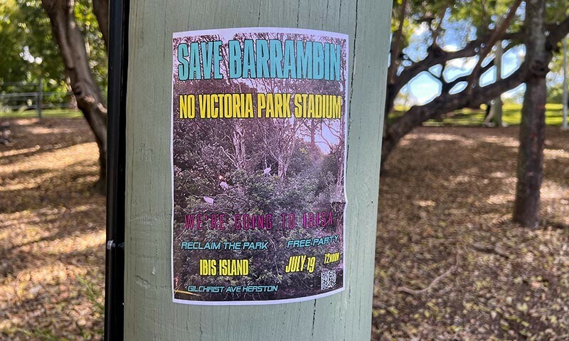A poster, advertising a gathering in support of a campaign against the building of a stadium in Victoria Park-Barrambin, is displayed on a pole in the park, in Brisbane, Australia July 21, 2025. &mdash; Reuters/File
