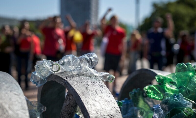 This photograph shows plastic bottles displayed as activists stage a demonstration in front of the United Nations Offices in Geneva on August 4, on the eve of the Plastics Treaty negotiations. &mdash; AFP