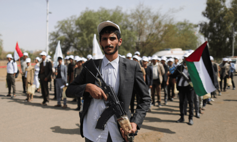  A student carrying a rifle takes part in a parade, along with other students, to show solidarity with Palestinians in the Gaza Strip, at the campus of Sanaa University in Sanaa, Yemen on August 6, 2025. &mdash; Reuters 