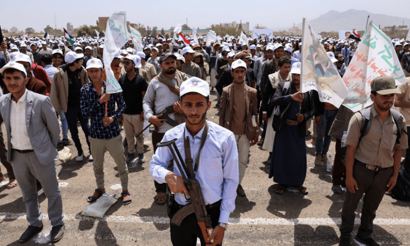  A student carrying a rifle takes part in a parade, along with other students, to show solidarity with Palestinians in the Gaza Strip, at the campus of Sanaa University in Sanaa, Yemen on August 6, 2025. &mdash; Reuters 