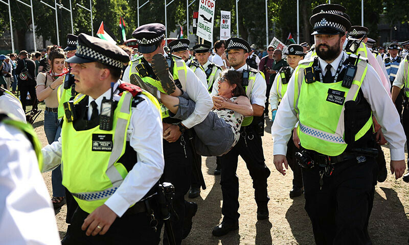 A protester is carried away by police officers at a &lsquo;Lift The Ban&rsquo; demonstration in support of the proscribed group Palestine Action, calling for the recently imposed ban to be lifted, in Parliament Square, central London, UK on August 9. &mdash; AFP