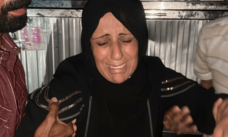  A relative of <em>Al Jazeera</em> journalist Mohammed Qreiqeh, who was killed by an Israeli strike, reacts in Gaza City on August 11, 2025. &mdash; Reuters 