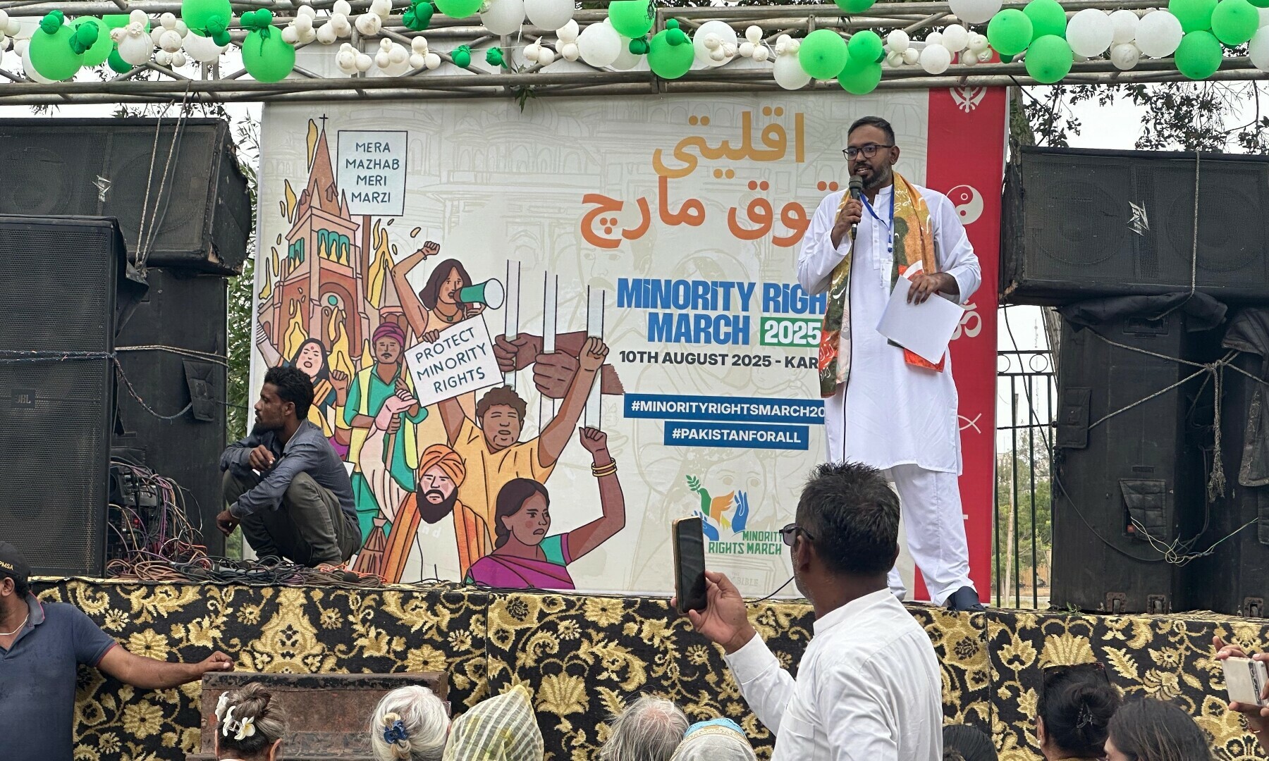 Organiser Luke Victor addresses the crowd at the Minority March at the YMCA ground in Karachi, on August 10, 2025. — Photo by Shifa