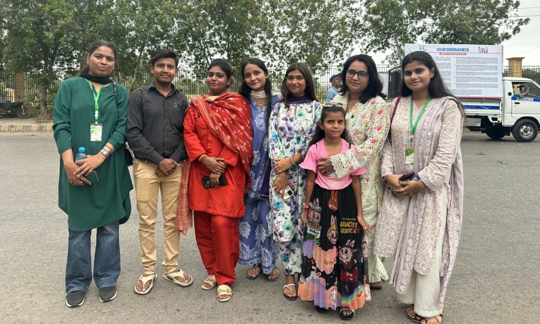 Activist Suhani Naveej and Sanjana Kumar pictured with their group from Jugati Foundation at the Minority Rights March 2025 in Karachi on August 10, 2025. — Photo by Shifa