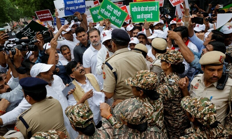 Rahul Gandhi, a lawmaker and a leader of India&rsquo;s main opposition Congress party, is stopped by police along with other lawmakers during a protest against what they say are electoral malpractices, in New Delhi, India on August 11. &mdash; Reuters