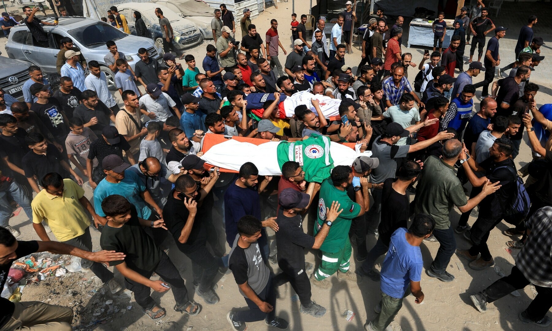 Mourners attend the funeral of Al Jazeera journalists Anas Al Sharif, Mohammed Qreiqeh, Ibrahim Zaher, Mohammed Noufal and another colleague, in Gaza City, August 11. &mdash; Reuters