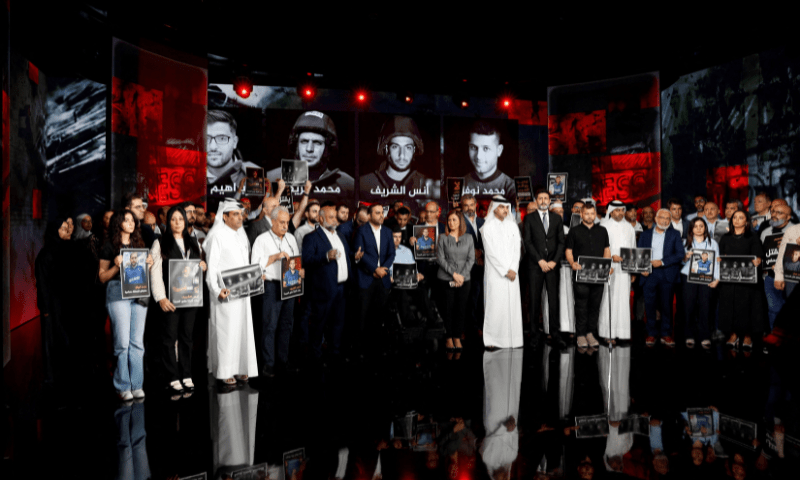  Al Jazeera staff members gather at the network&rsquo;s studios, to remember their colleagues Anas Al Sharif, Mohammed Qreiqeh, Ibrahim Zaher, Mohammed Noufal and another colleague, who were killed in Gaza City by an Israeli strike, in Doha, Qatar on August 11, 2025. &mdash; Reuters 