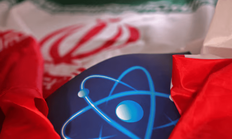 Atomic symbol and Iranian flag are seen in this illustration taken on September 8, 2022. &mdash; Reuters/File