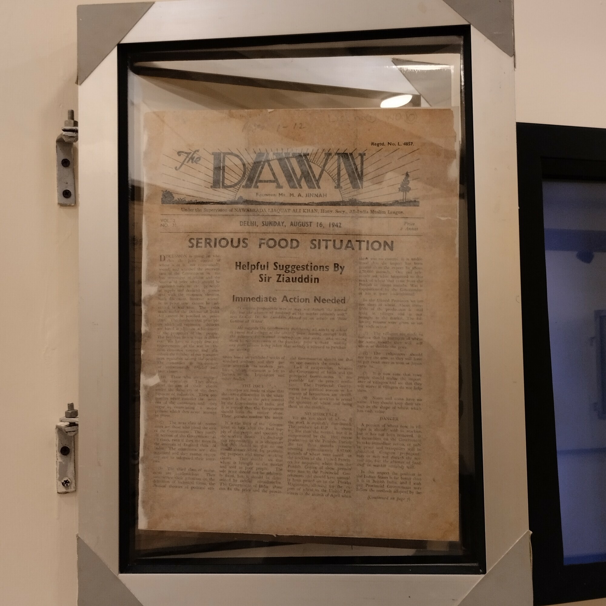  A restored copy of <em>Dawn</em> from 1942 on display as part of the newspaper collection at the Sindh Archives 
