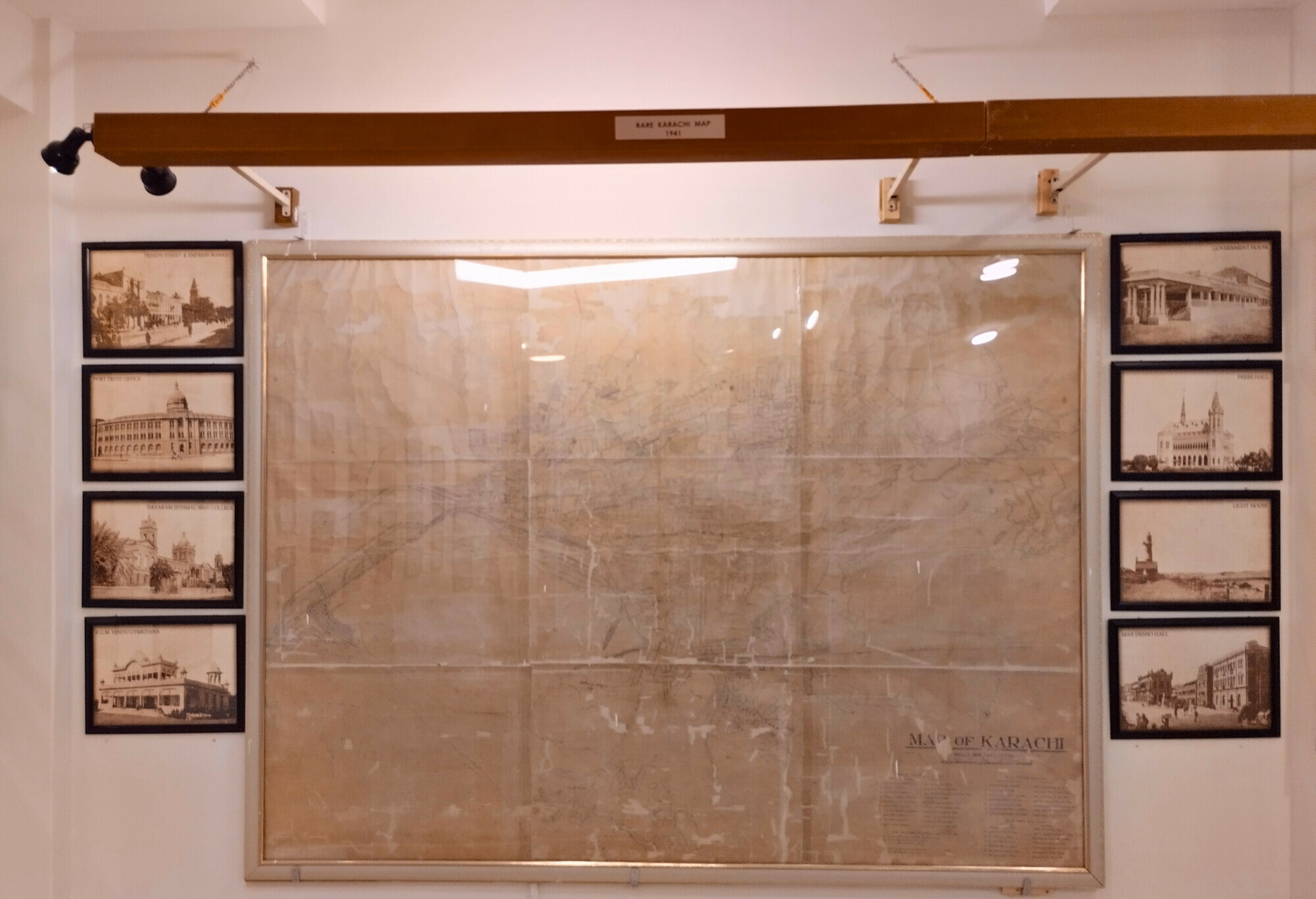  A historical map of Karachi from 1941 alongside pictures of city landmarks of the time 
