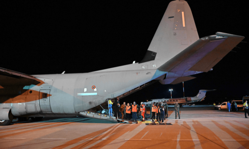  Medics and health personnel welcome Palestinian children from Gaza and their families, after an Italian military plane C130J from Israel landed on August 14, 2025, at Rome&rsquo;s Ciampino airport. &mdash; AFP 