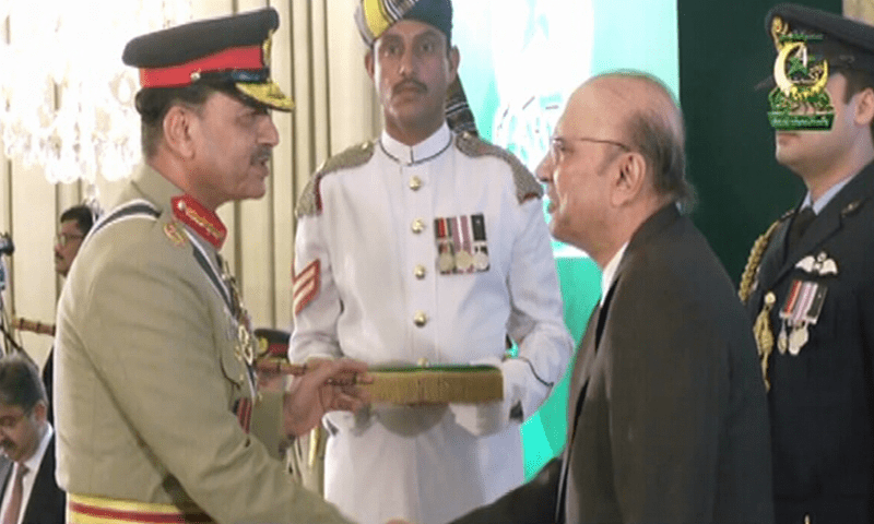 Chief of Army Staff Field Marshal Asim Munir receives the Hilal-i-Jurat from President Asif Ali Zardari at a ceremony at the Presidency on August 14. — DawnNewsTV
