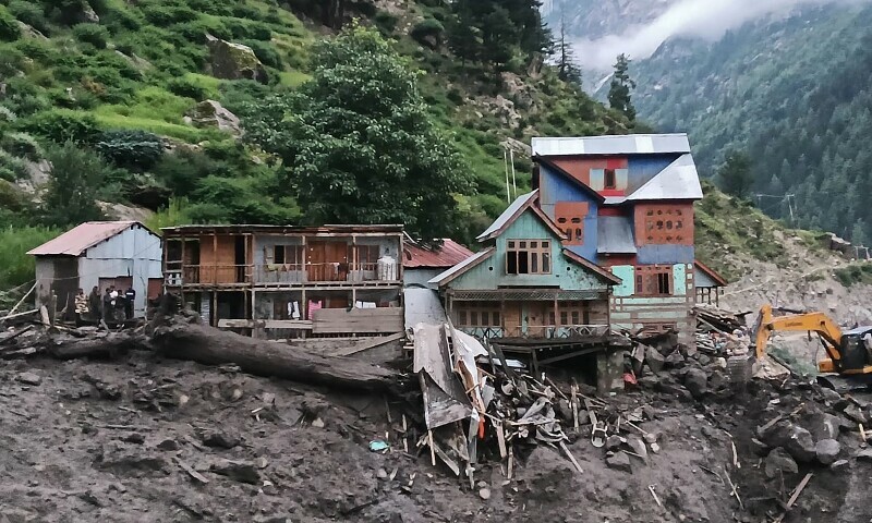 Rescuers inspect the site of a flashflood at a village in Kishtwar district, India-occupied Kashmir, on August 14. — AFP Rescuers inspect the site of a flashflood at a village in Kishtwar district, India-occupied Kashmir, on August 14. — AFP