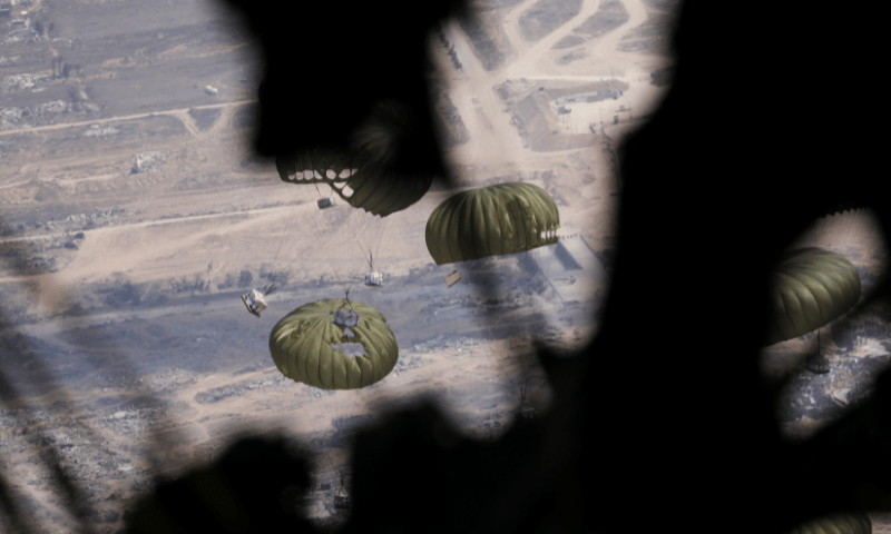  Jordanian military personnel airdrop aid parcels over Gaza on August 17, 2025. &mdash; Reuters 