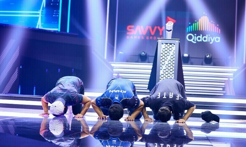 Pakistani gamers Arslan &ldquo;Ash&rdquo; Siddique, Imran Khan and Atif Butt take a bow after winning the Gamers8 Tekken 7 Nations Cup in Riyadh, Saudi Arabia on July 10, 2023. &mdash; Gamers8 Esports Twitter