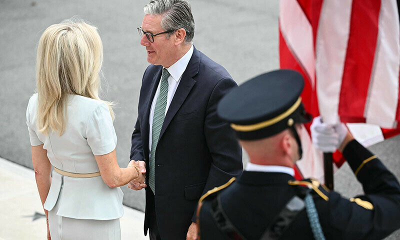 British Prime Minister Keir Starmer is greeted by US Chief of Protocol Monica Crowley (L) upon arrival at the White House South Portico in Washington, DC, US on August 18. — AFP