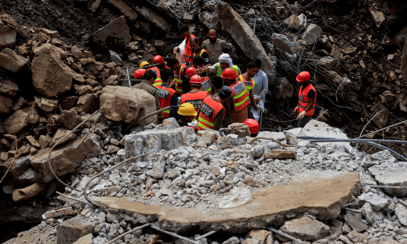 Rescue workers look for victims, following a storm that caused heavy rains and flooding in Dalori Bala village in Gadoon district in Khyber Pakhtunkhwa province, Pakistan on August 19, 2025. — Reuters