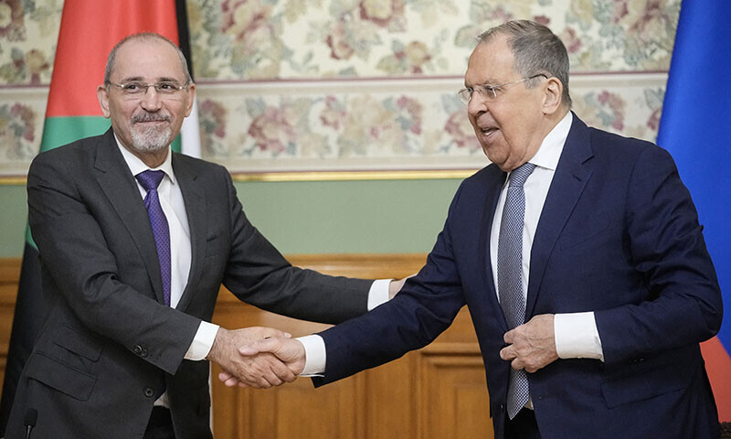 Russia’s Foreign Minister Sergey Lavrov (R) and Jordan’s Foreign Minister Ayman Safadi shake hands as they leave a signing ceremony following their talks at Zinaida Morozova’s Mansion in Moscow, Russia on August 20. — AFP