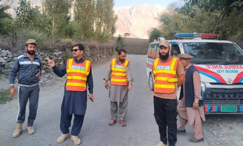 Rescue 1122 personnel carry out a rescue operation after a glacier burst in Gilgit-Baltistan blocked the Ghizer River, Aug 22. — Rescue 1122