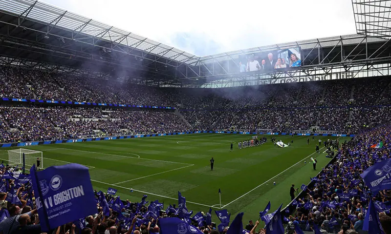 Players walk out onto the pitch ahead of the English Premier League football match between Everton and Brighton and Hove Albion at Hill Dickinson Stadium in Liverpool, northwest England on August 24. — AFP