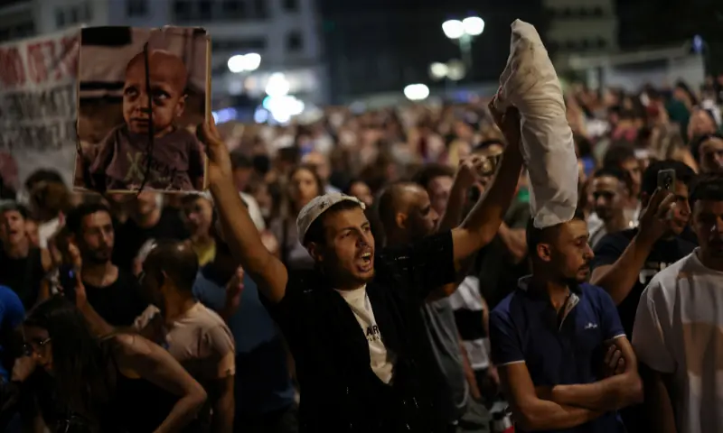  A pro-Palestinian protester holds a mock baby body wrapped in cloth during a demonstration in support of Palestinians in Gaza, amid the ongoing conflict between Israel and Hamas, at Syntagma Square in Athens, Greece on August 24, 2025. &mdash; Reuters 
