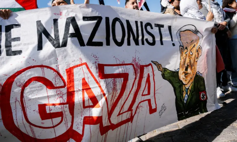  Protesters hold a banner depicting Israeli Prime Minister Benjamin Netanyahu during a demonstration called &ldquo;All of Denmark on the streets for a free Palestine&rdquo;, in support of Palestinians in Gaza, amid the ongoing conflict between Israel and Hamas, in Copenhagen, Denmark on August 24, 2025. &mdash; Reuters 