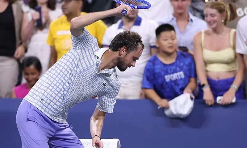 Daniil Medvedev breaks his racket after losing in five sets to Benjamin Bonzi of France during their Men&rsquo;s Singles First Round match on Day One of the 2025 US Open at USTA Billie Jean King National Tennis Center on August 24, 2025 in the Flushing neighborhood of the Queens borough of New York City.   &mdash; AFP