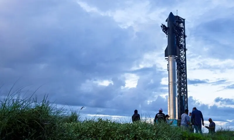 Spectators watch from the dunes as preparations to launch a SpaceX Starship spacecraft continue, at the company&rsquo;s complex in Starbase, Texas, US, August 25. &mdash; Reuters