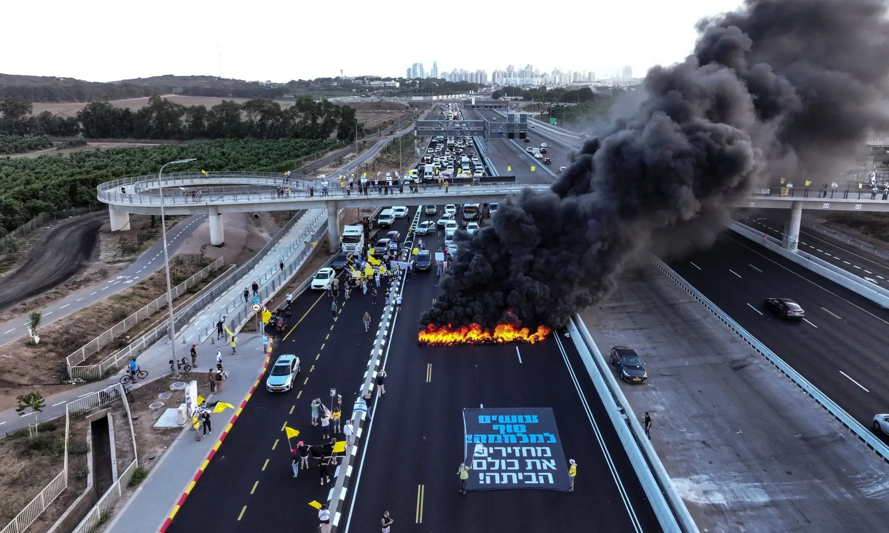 A drone view of protesters blocking a main road during a demonstration demanding the immediate end of the war and the release of all hostages who were kidnapped during the October 7, 2023 attack, in Yakum near Tel Aviv, Israel on Aug 26, 2025. &mdash; Reuters/Yair Palti 