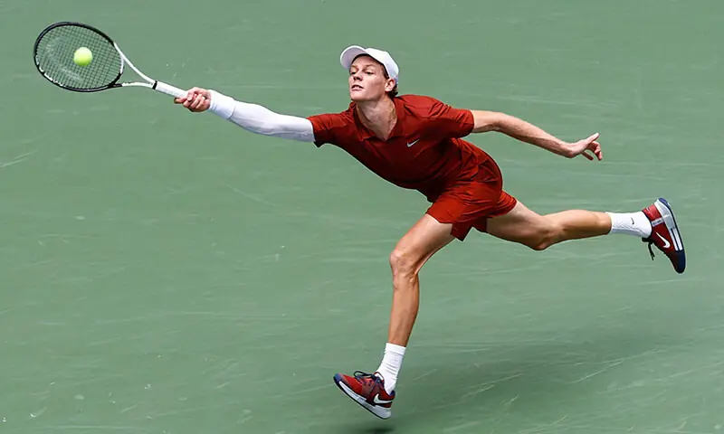 Italy’s Jannik Sinner plays a forehand return to Australia’s Alexei Popyrin during their men’s singles second round tennis match on day five of the US Open tennis tournament at the USTA Billie Jean King National Tennis Centre in New York City, on August 28, 2025. — AFP