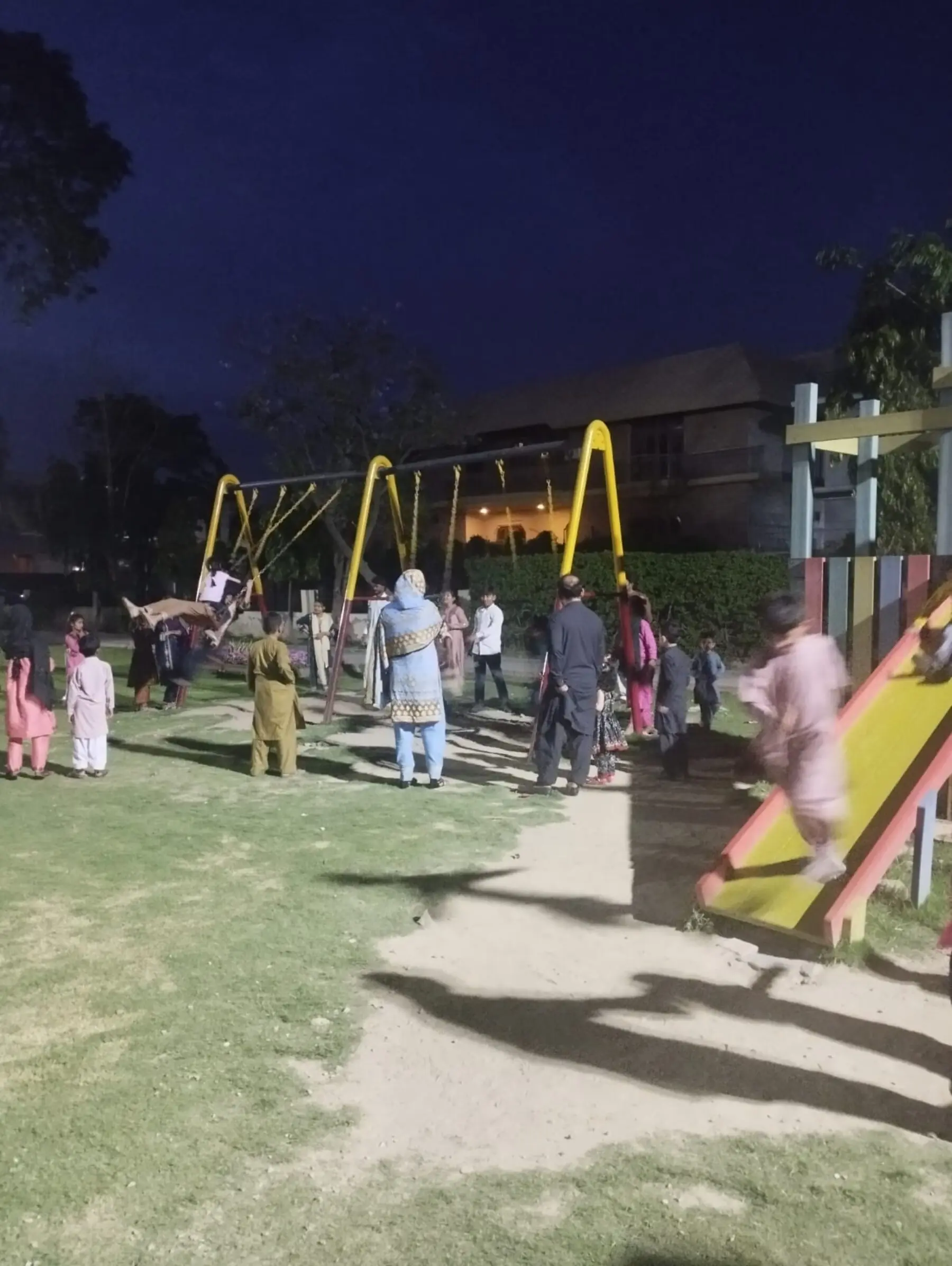Residents of Peer colony celebrating Eid by enjoying the facilities in a nearby DHA park. Source: IJURR journal paper