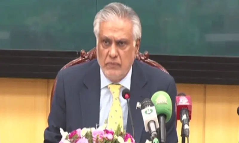 Deputy Prime Minister and Foreign Minister Ishaq Dar addresses a press briefing in Islamabad on August 29. &mdash; DawnNewsTV