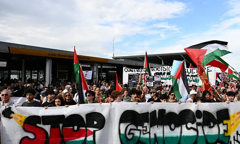 People take part in a demonstration in support of Gaza and the Palestinian people at Venice Lido during the 82nd Venice International Film Festival in Italy on August 30. &mdash; AFP
