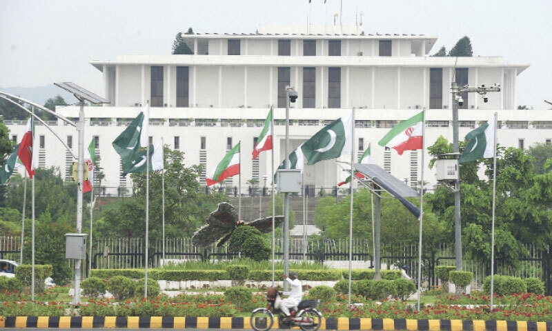 Pakistani and Iranian flags are displayed on Constitution Avenue. Iranian President Masoud Pezeshkian is due to arrive in the country today for a two-day visit.&mdash;Mohammad Asim/White Star