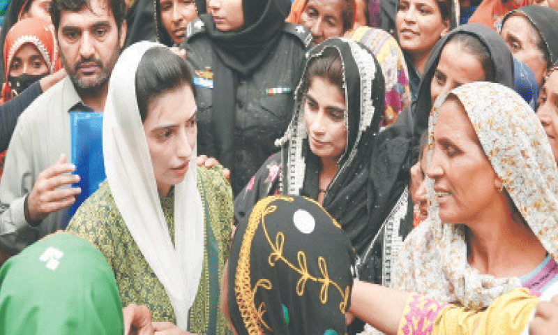 MNA Aseefa Bhutto-Zardari interacts with women at the ceremony.&mdash;Dawn