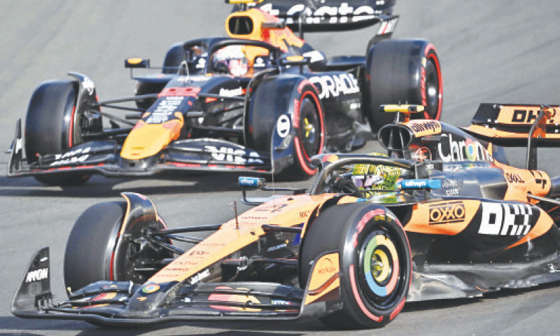 McLaren&rsquo;s Lando Norris (below) of Britain and RB&rsquo;s Yuki Tsunoda of Japan drive during the second practice session of the Formula One Hungarian Grand Prix at the Hungaroring race track on Friday.&mdash;AFP