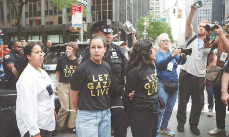 Tiffany Caban, a member of New York City Council, stands with her hands ziptied after she was detained  with other Pro-Palestinian activists, who protested outside the offices of US Senate Minority Leader Chuck Schumer.&mdash;Reuters