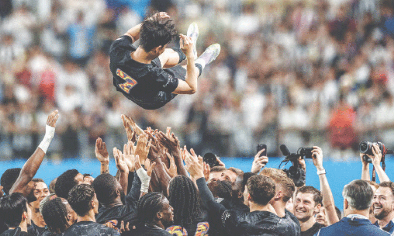 SEOUL: Team-mates lift Tottenham Hotspur captain Son Heung-min up in the air during celebrations to bid him farewell at the end of their friendly against Newcastle United on Sunday.&mdash;AFP