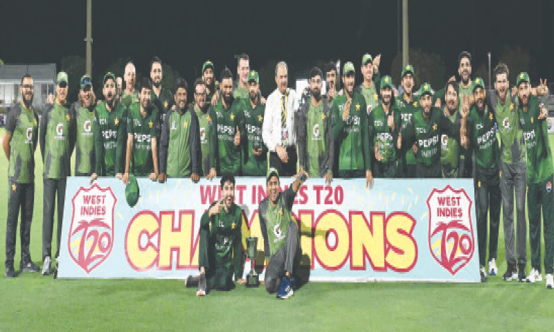 PAKISTAN players pose with the trophy after winning the T20 International against West Indies at the Central Broward Park & Broward County Stadium.&mdash;AFP