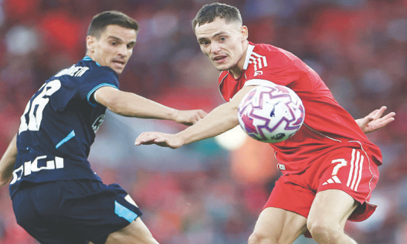 LIVERPOOL&rsquo;S Florian Wirtz (R) vies for the ball with Inigo Ruiz de Galarreta of Athletic Bilbao during their friendly match at Anfield.&mdash;Reuters