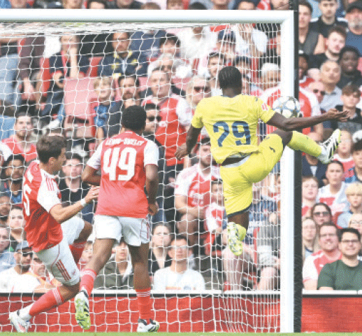 VILLARREAL&rsquo;S Etta Eyong (R) scores against Arsenal during their pre-season friendly at the Emirates Stadium.&mdash;AFP