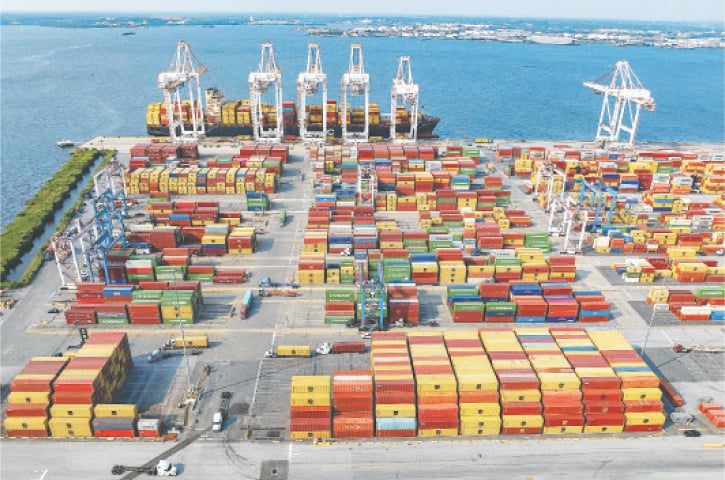 An aerial view of shipping containers at the Port of Baltimore on Thursday. The new US tariffs are part of a broader trade agenda that includes sector-specific duties on semiconductors, pharmaceuticals, vehicles, steel, aluminium, copper, and lumber. —AFP