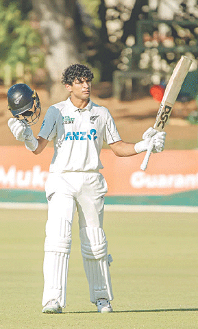  NEW ZEALAND batter Rachin Ravindra celebrates scoring his century during the second Test against Zimbabwe at the Queens Sports Club on Friday.—courtesy Zimbabwe Cricket