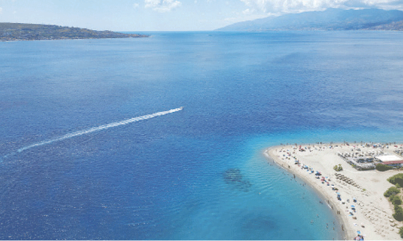 A DRONE view of the Sicilian coast, with the Calabrian shoreline visible across the Strait of Messina, part of a planned site for construction of a suspension bridge connecting Sicily to mainland Italy.&mdash;Reuters