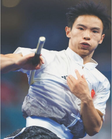  CHENGDU: China&rsquo;s Jiushang Gao competes to win the men&rsquo;s wushu changquan-daoshu-gunshu final at the World Games on Saturday.&mdash;Reuters 
