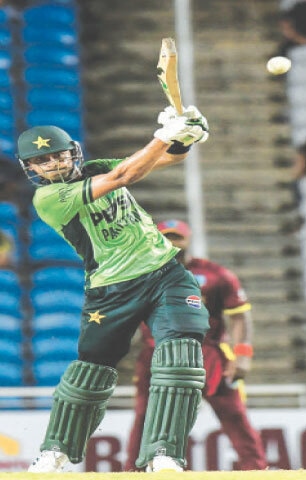 TAROUBA: Pakistan batter Hasan Nawaz hits a boundary during his unbeaten half-century in the first One-day International against the West Indies at the Brian Lara Cricket Academy.&mdash;AFP