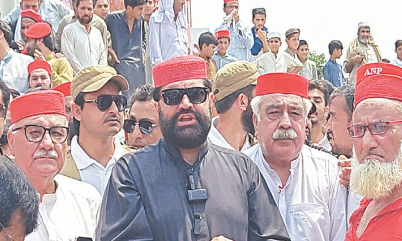 Aimal Wali Khan talking to media-persons in Charsadda on Tuesday. &mdash; Dawn