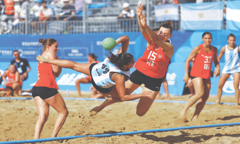 ARGENTINA&rsquo;S Agostina Arcajo (C) in action with Julia Constanze Chiara Drachsler of Germany during their beach handball final in the World Games at the Xinglong Lake Beach Arena on Tuesday.&mdash;Reuters