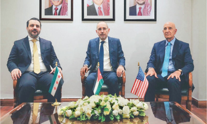 (From left) Syria&rsquo;s interim foreign minister Asaad al-Shaibani, Jordan&rsquo;s Foreign Minister Ayman Safadi, and US special envoy for Syria Tom Barrack meet in Amman.&mdash;AFP
